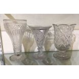 A group of three cut glass flower vases. Est. £10