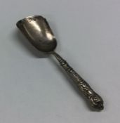A Victorian silver caddy scoop with Kings' pattern