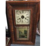 An old mahogany cased wall clock. Est. £30 - £50.