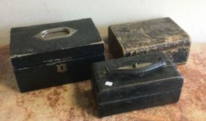 A group of three leather jewellery boxes. Est. £15