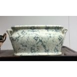 A large stoneware two handled foot bath. Est. £20