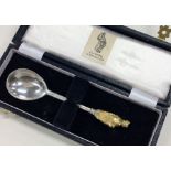 A good cast silver and silver gilt spoon in fitted