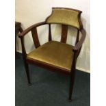 An Edwardian inlaid chair. Est. £20 - £30.