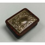 A silver gilt and mahogany box with lift-off cover