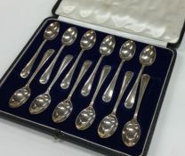 A good set of twelve silver OE pattern silver teas