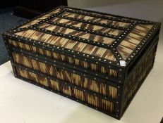A Continental cane and ebony mounted box with hing