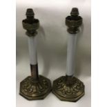 A good pair of stylish Arts & Crafts lamps on shap