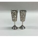 A pair of Russian pierced silver goblets decorated