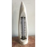 A walrus tusk mounted as a thermometer. Est. £30 -