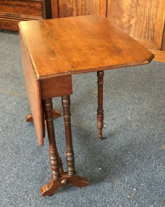 An Edwardian Sutherland table on turned supports. - Image 2 of 3