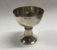 A stylish silver trophy cup on spreading foot. Bir