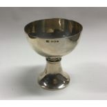 A stylish silver trophy cup on spreading foot. Bir