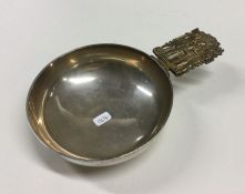 A good heavy silver bleeding bowl with gilt handle