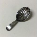 A bright cut silver caddy spoon. London. By GW. Ap