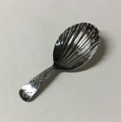 A bright cut silver caddy spoon. London. By GW. Ap