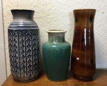 A group of three Danish pottery vases. Est. £25 -