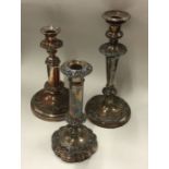 A group of three Old Sheffield plated candlesticks