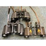 Three pairs of leather cased binoculars. Est. £30