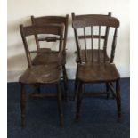 Four pitch pine dining chairs. Est. £30 - £50.