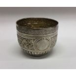 An attractive chased silver sugar bowl decorated w