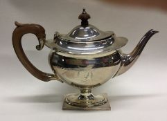 An Edwardian silver teapot on pedestal base. Birmi