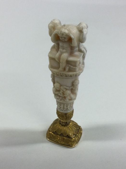 A finely carved Continental gold and ivory taperin - Image 2 of 3