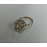 An 18 carat gold single stone ring in claw mount.