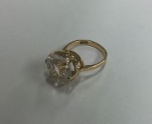 An 18 carat gold single stone ring in claw mount.
