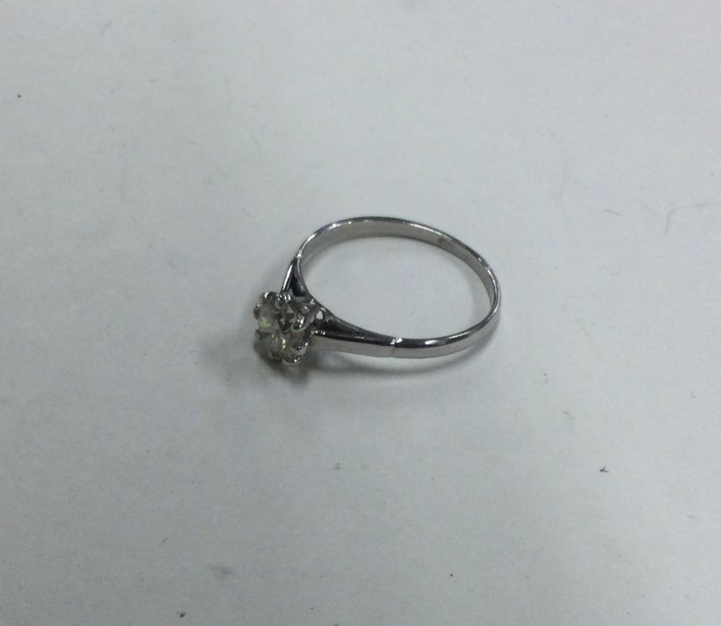 A good diamond single stone ring in platinum claw