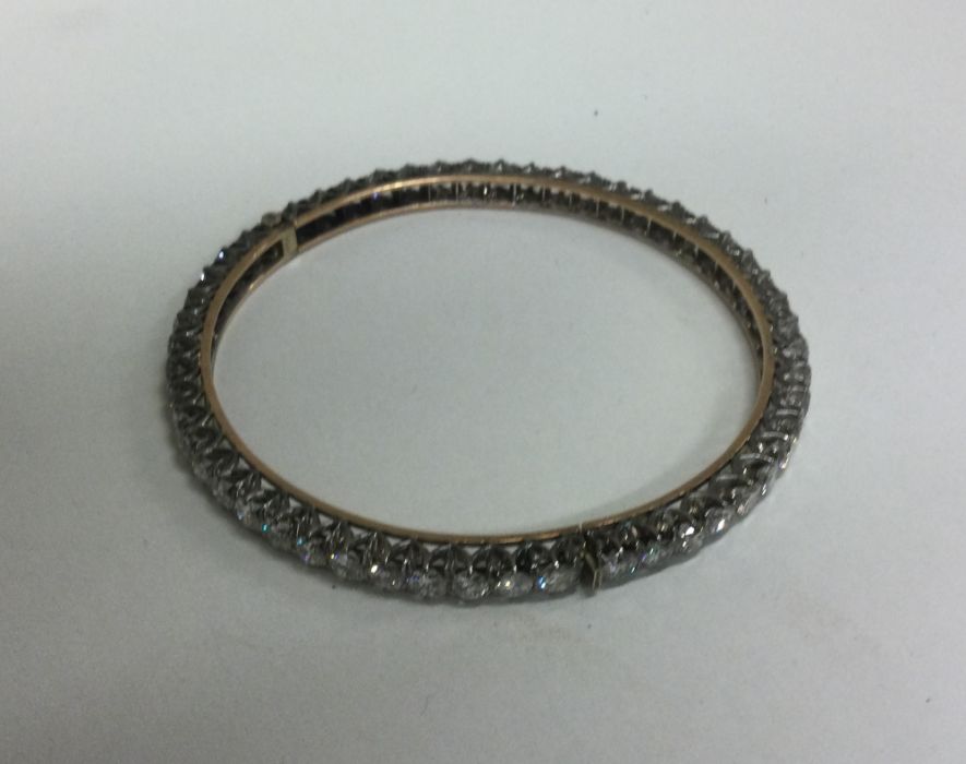 A good diamond fifty stone hinged bracelet with co - Image 2 of 3