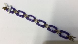 A lavender jade bracelet of Art Deco form with dia