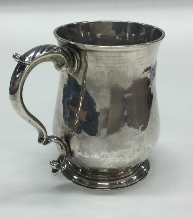 A good Georgian silver baluster shaped mug on swee - Image 2 of 3