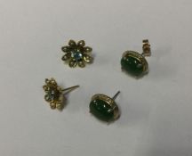 A pair of pearl mounted ear pendants set in gold e