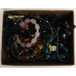 A box containing costume jewellery, silver filigre