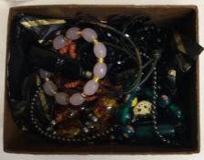 A box containing costume jewellery, silver filigre