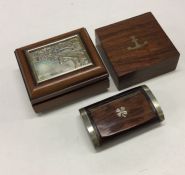 A group of three hardwood silver mounted snuff box