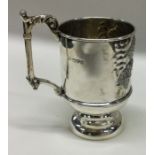 CHESTER: A good christening mug decorated with winged infants.