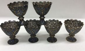 A rare set of six Chinese silver and enamelled