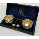 CHESTER: An attractive cased pair of chased silver
