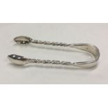 A pair of Edwardian silver sugar tongs with twiste