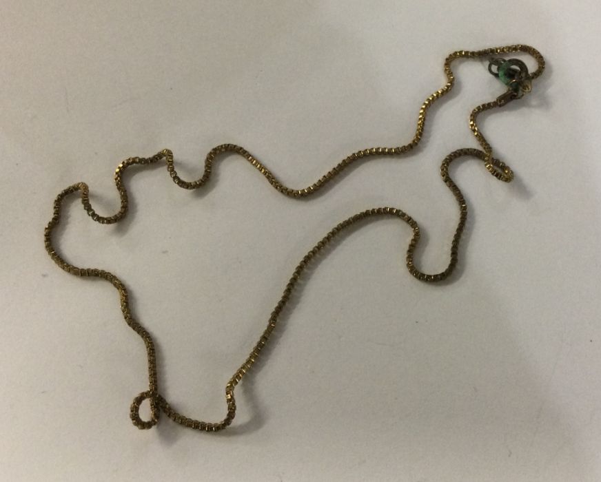 A small 9 carat fine link chain. Approx. 4 grams.