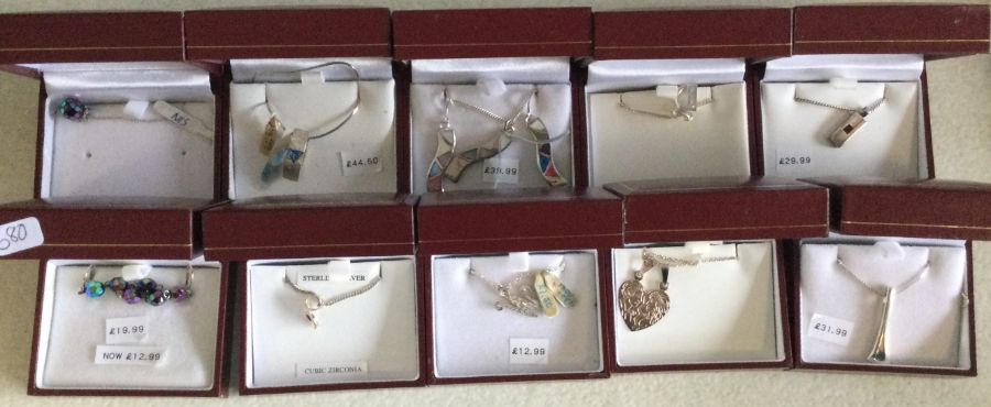 Ten pairs of silver earrings. Est. £20 - £30.