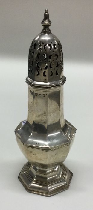 A large Scottish silver sugar caster of shaped for