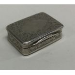 An engraved silver snuff box with vacant cartouche