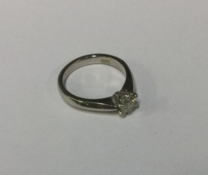 A diamond single stone ring in 18 carat white gold