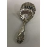 A heavy fiddle, thread and shell crested silver ca