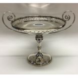 An attractive large pierced silver tazza of stylis