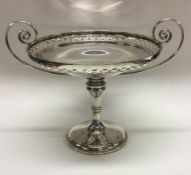 An attractive large pierced silver tazza of stylis