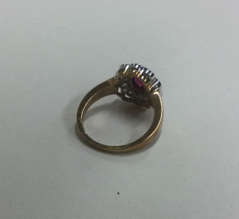 A large oval diamond and ruby cluster ring. Approx - Image 3 of 3