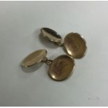 A pair of heavy 9 carat oval cufflinks. Approx. 7